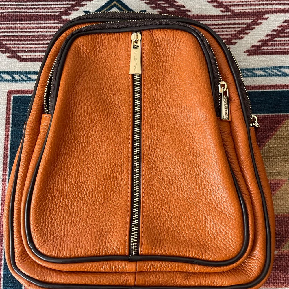 Valentina Italia Women’s leather Convertible sling backpack in orange